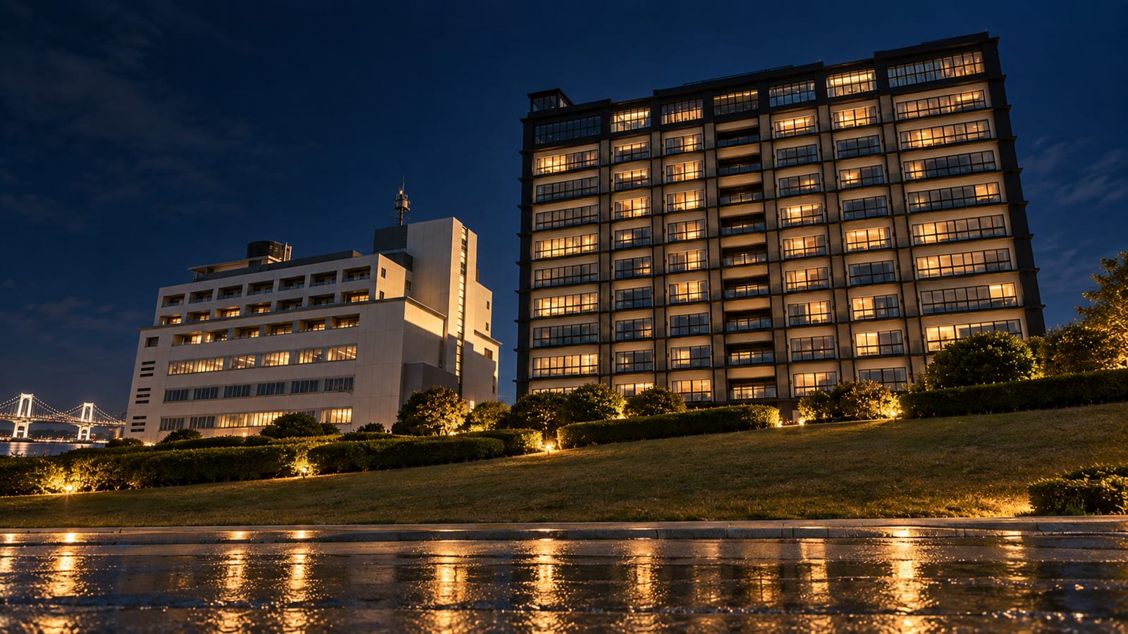 The exterior of the building housing the Manor, lit at night (Aomi, Koto-ku, Tokyo)